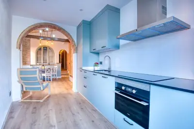 Una cocina o zona de cocina en Pati Blau 1