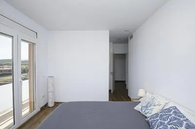 Cama o camas de una habitación en Bonita casa en Sant Gregori