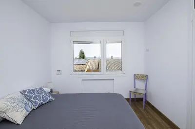 Cama o camas de una habitación en Bonita casa en Sant Gregori