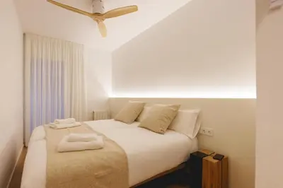 Cama o camas de una habitación en Bravissimo Pou Rodó, 2-bedroom and bike friendly