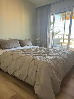 Cama o camas de una habitación en Отдых у моря Ллорет де мар