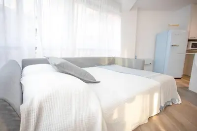 Cama o camas de una habitación en CALMA HOME- Relájate y disfruta a 1 minuto del mar
