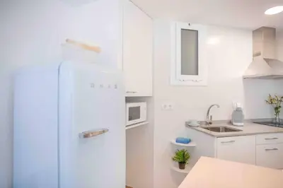 Una cocina o zona de cocina en CALMA HOME- Relájate y disfruta a 1 minuto del mar