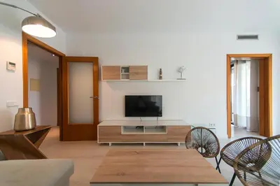 Una televisión o centro de entretenimiento en WELCS APARTAMENTO 189 PDA con piscina comunitaria