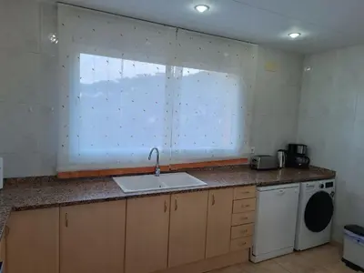 Una cocina o zona de cocina en Villa Galicia