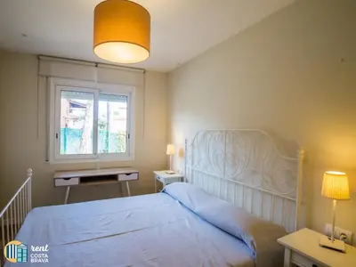Cama o camas de una habitación en Casa Margarita en Platja d'Aro