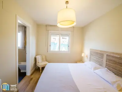 Cama o camas de una habitación en Casa Margarita en Platja d'Aro