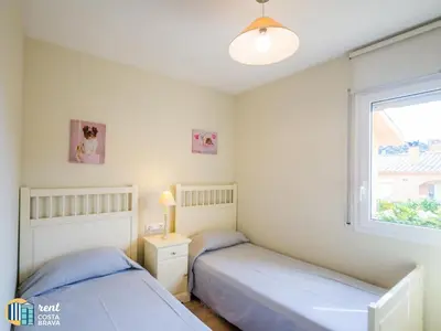 Cama o camas de una habitación en Casa Margarita en Platja d'Aro