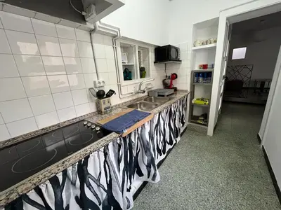 Una cocina o zona de cocina en Acogedor apartamento