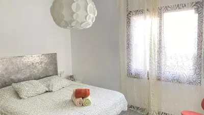 Cama o camas de una habitación en Acogedor apartamento