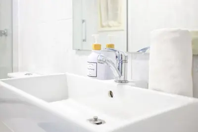 Un baño de Luminoso apartamento en Tossa de Mar a un paso de la playa