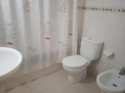 Un baño de APARTAMENTO PRÓXIMO a LA PLAYA