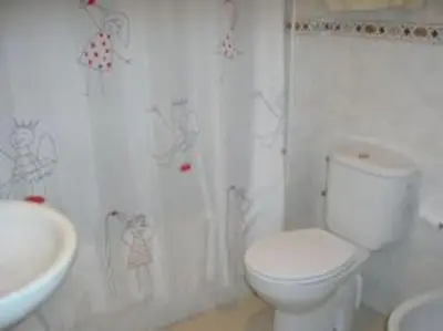 Un baño de APARTAMENTO PRÓXIMO a LA PLAYA