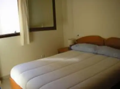 Cama o camas de una habitación en APARTAMENTO PRÓXIMO a LA PLAYA