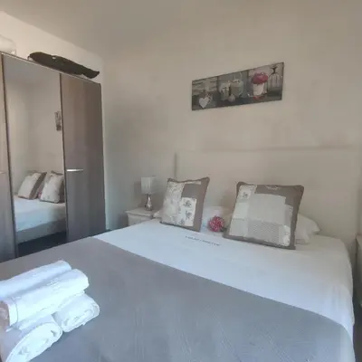Cama o camas de una habitación en VILLAS COSETTE Apartamento CAMILLE