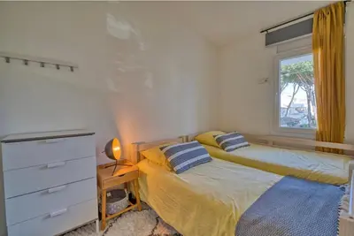 Cama o camas de una habitación en Apartment with pool and tennis courts in Calella de Palafrugell