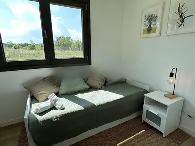 Cama o camas de una habitación en Magnífica casa con piscina