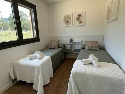 Cama o camas de una habitación en Magnífica casa con piscina