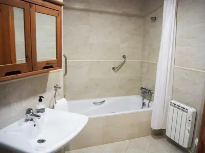 Un baño de Apartamento grande a 3min playa