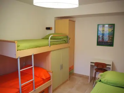 Cama o camas de una habitación en Apartamento grande a 3min playa