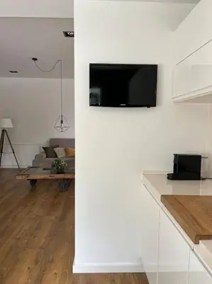 Una televisión o centro de entretenimiento en Casa Mont-mar