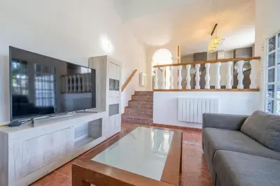 Una televisión o centro de entretenimiento en Casa Bon Descans