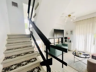Una televisión o centro de entretenimiento en Casa Brisa