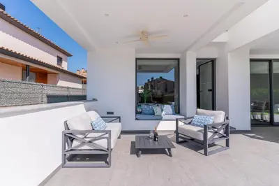 Zona de estar de Costa Brava Suites 