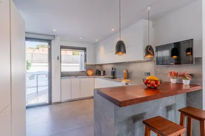 Una cocina o zona de cocina en Costa Brava Suites 