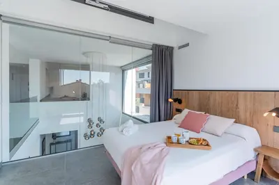 Cama o camas de una habitación en Costa Brava Suites 