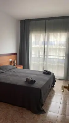 Cama o camas de una habitación en AL48 Apartment near leisure and beach Lloret