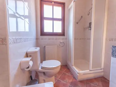 Un baño de Villa in Calonge with Pool and Mountain Views