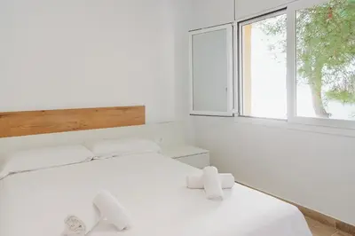 Cama o camas de una habitación en WELCS DUPLEX 192 PDA cerca del mar