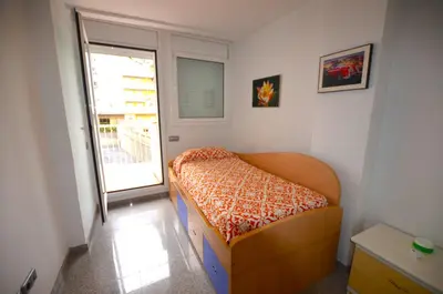 Cama o camas de una habitación en Apartamento frente a la playa Blanes Costa Brava