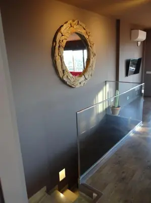Una televisión o centro de entretenimiento en Precioso duplex en Begur con vistas al mar