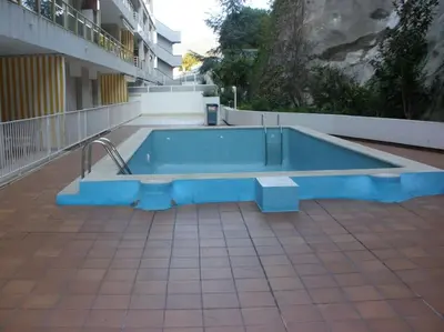Piscina en o cerca de ACOGEDOR APARTAMENTO con PISCINA PRÓXIMO A LA PLAYA