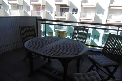 Un balcón o terraza de AMPLIO Y CONFORTABLE APARTAMENTO con PARKING
