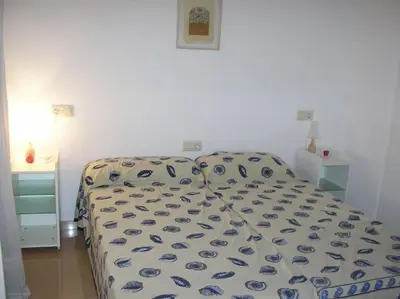 Cama o camas de una habitación en APARTAMENTO CÉNTRICO a 3 MINUTOS DE LA PLAYA