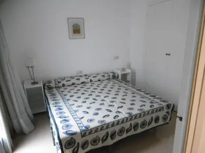 Cama o camas de una habitación en APARTAMENTO CÉNTRICO a 3 MINUTOS DE LA PLAYA