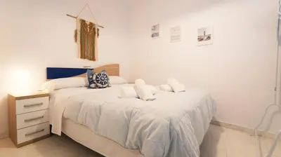 Cama o camas de una habitación en SeaHomes Vacations - Sabanell Dreamplace apt with PKG