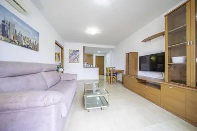 Una televisión o centro de entretenimiento en HomeHolidaysRentals Belisa - Costa Barcelona