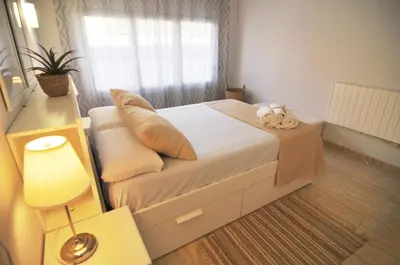 Cama o camas de una habitación en HomeHolidaysRentals Blue - Costa Barcelona
