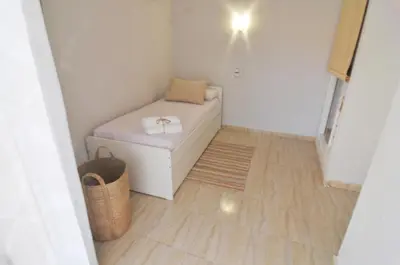 Cama o camas de una habitación en HomeHolidaysRentals Blue - Costa Barcelona