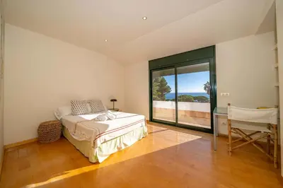 Cama o camas de una habitación en Villa Les Oliveres Piscina Privada Vistas Mar Aire Acondicionado