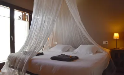 Cama o camas de una habitación en B&B El Ranxo