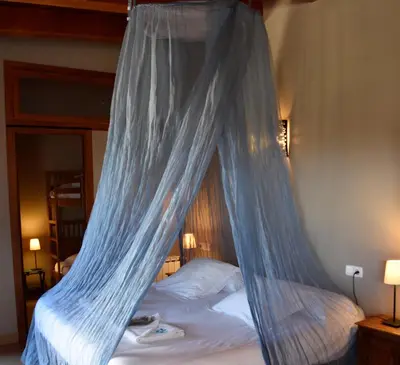Cama o camas de una habitación en B&B El Ranxo