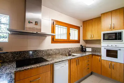 Una cocina o zona de cocina en Club Villamar - Nuzus