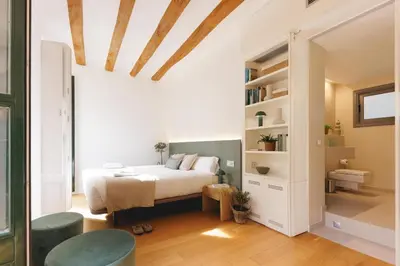 Cama o camas de una habitación en Bravissimo La Joia del Barri Vell