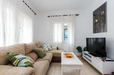 Una televisión o centro de entretenimiento en Apartamento Jesma