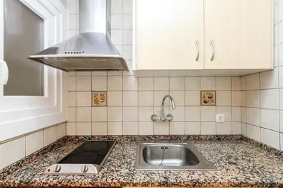 Una cocina o zona de cocina en Apartamento Jesma